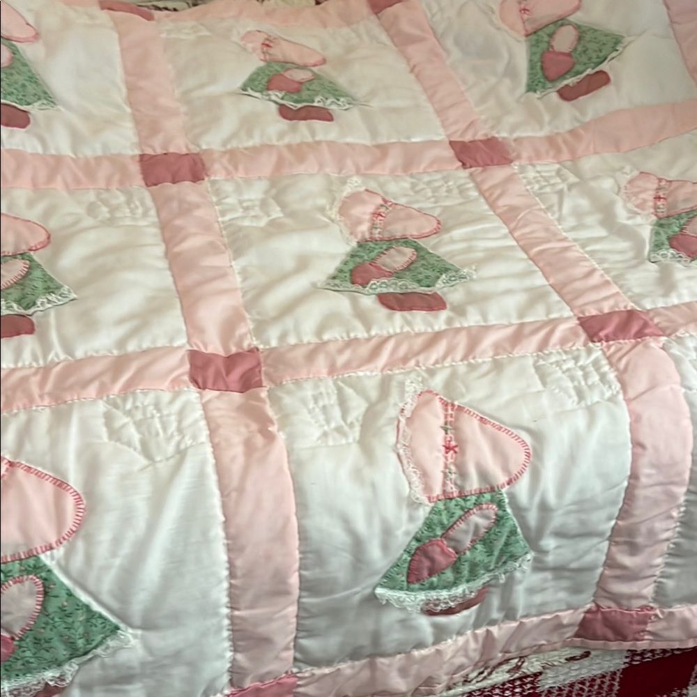 Handmade bonnet doll quilt